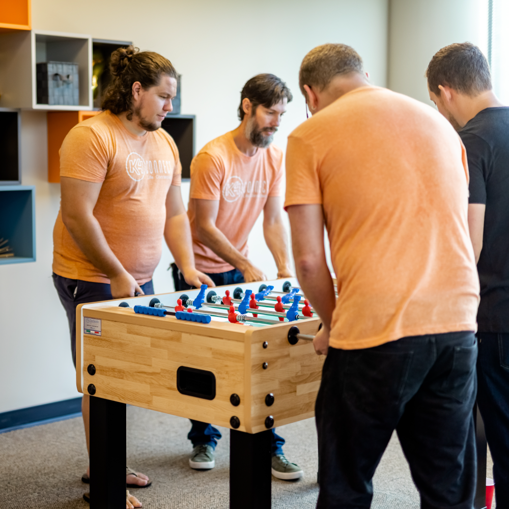 K4Connect advocates playing foosball in the office lounge